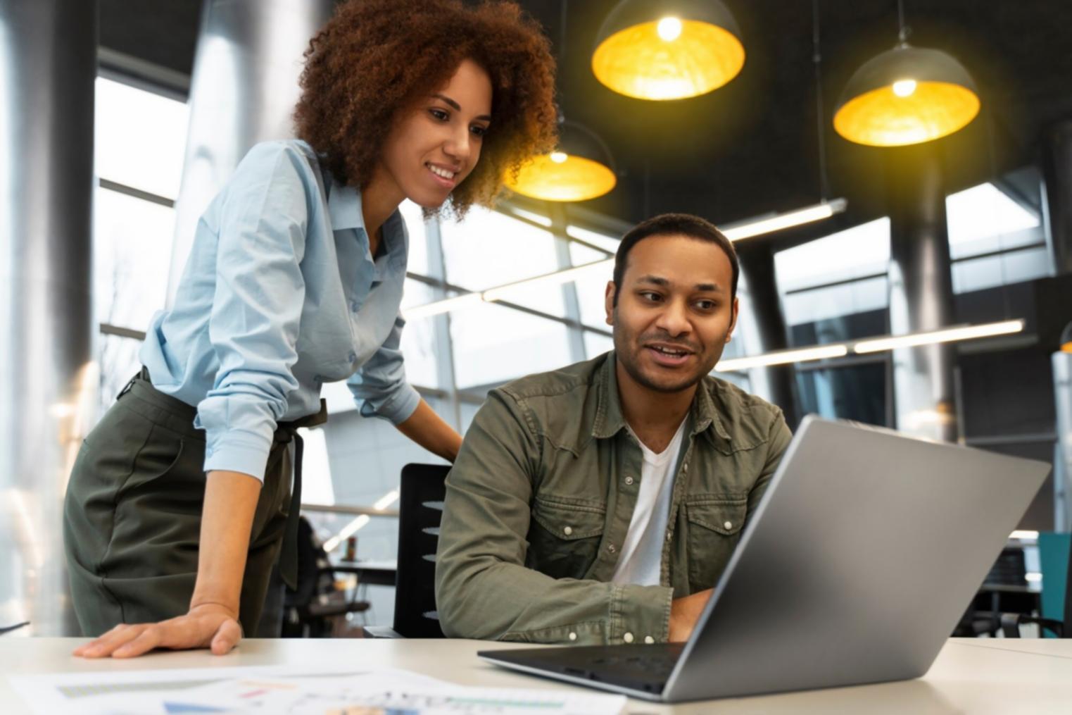 Financial analyst reviewing forecasting models and data charts